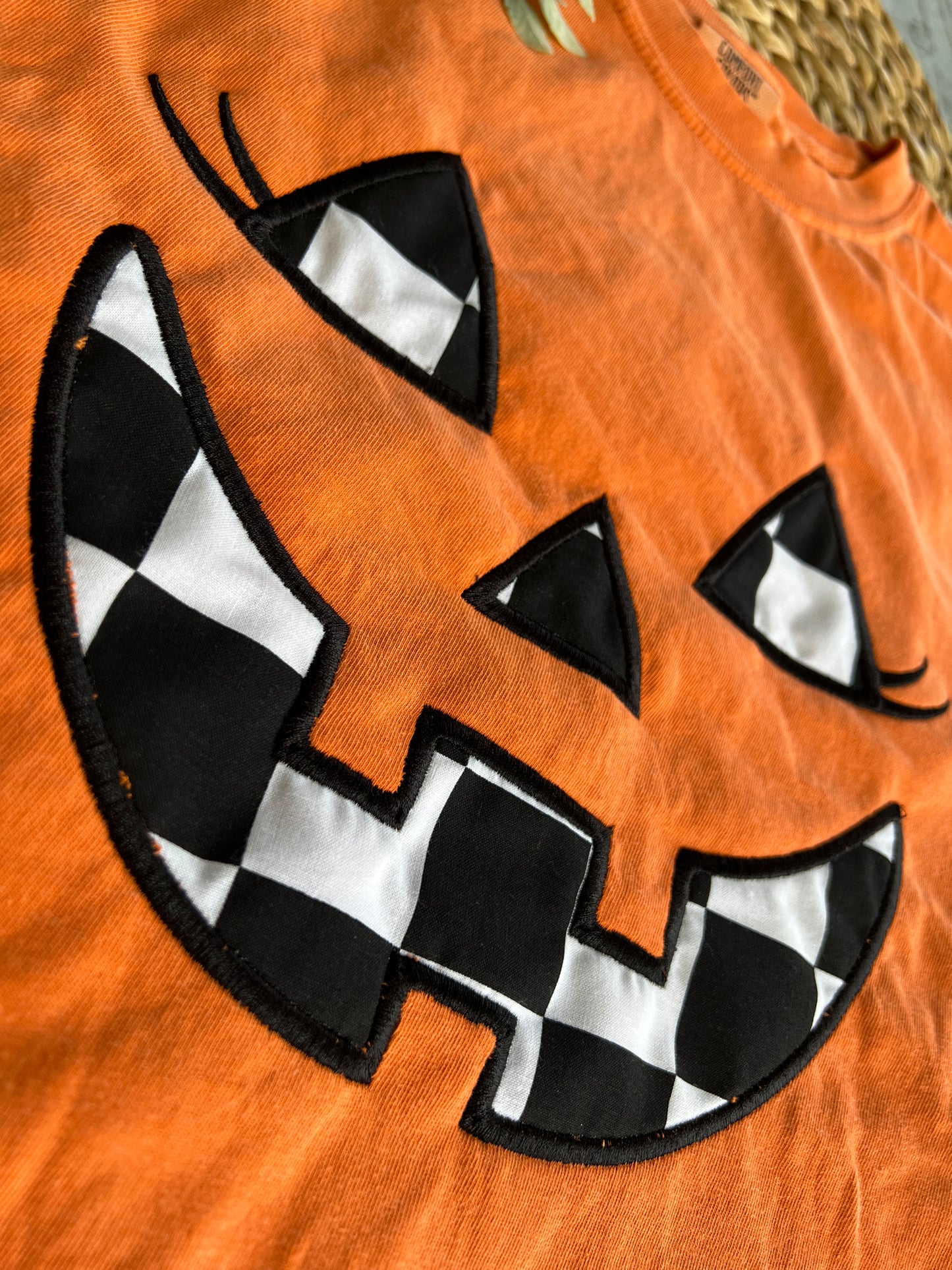 Jackie Jack-O-Lantern Halloween Black/White Checkered Fabric Design Embroidery T-Shirt