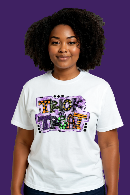 Person wearing a white t-shirt with 'Trick or Treat' design on a plain background