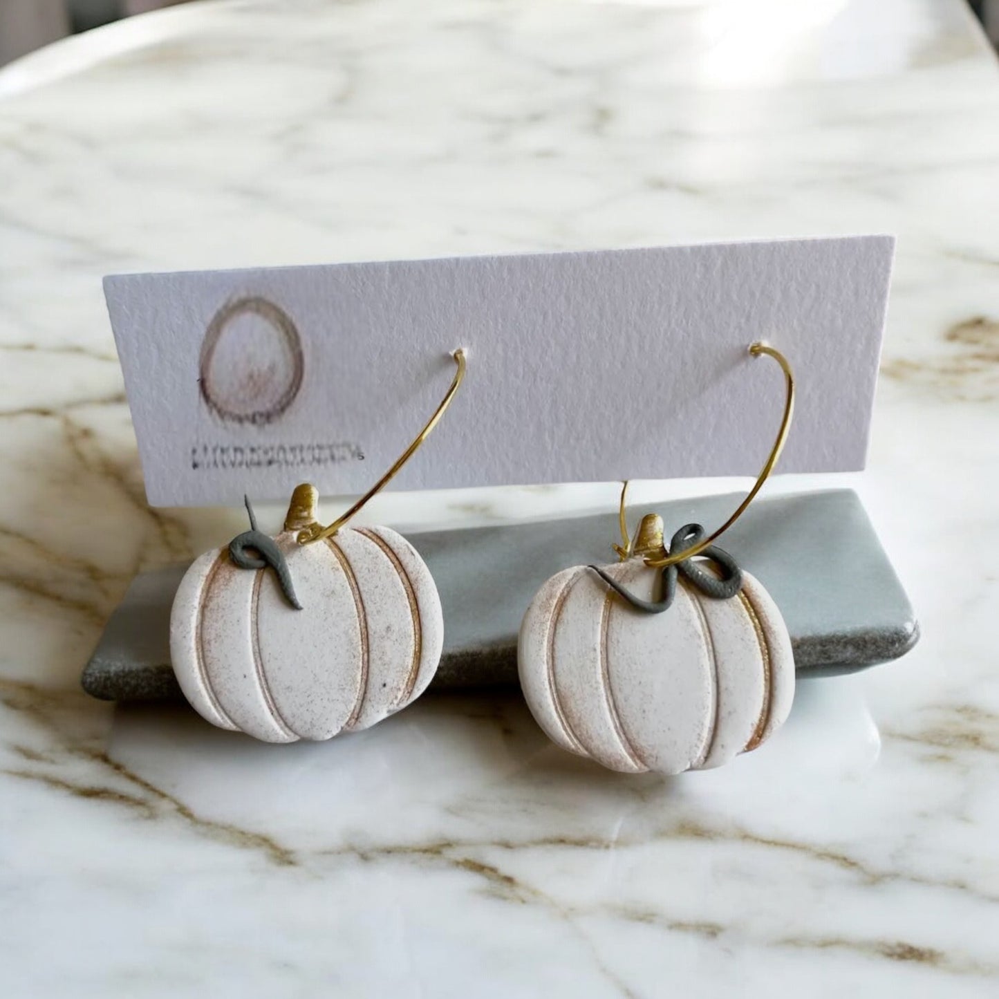 WHITE PUMPKIN HOOP EARRINGS