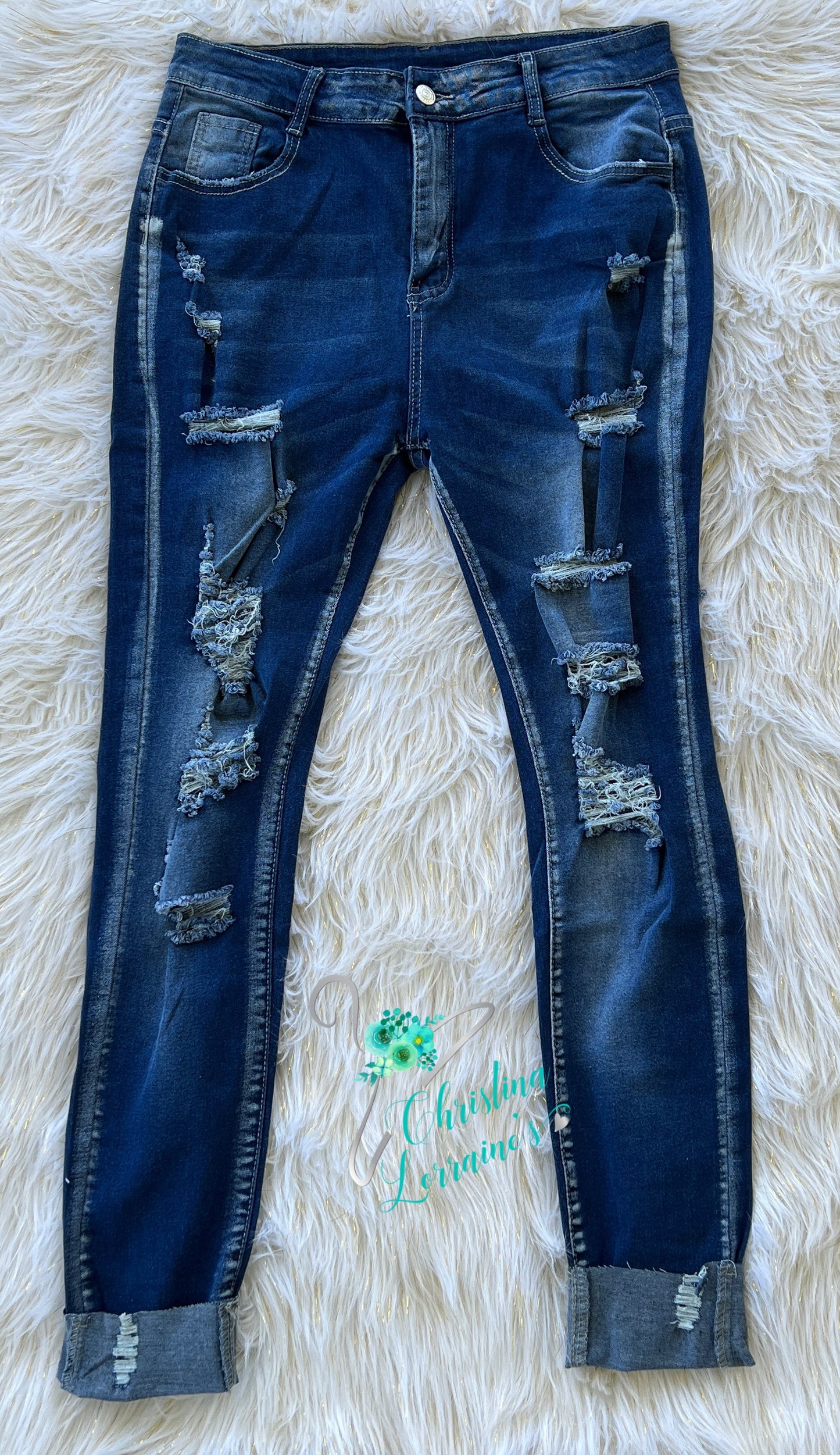STRETCH RIPPED JEANS